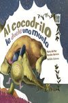 AL COCODRILO LE DUELE UNA MUELA